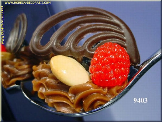 Spoon with raspberry, chocolate, almond and cream - imitation